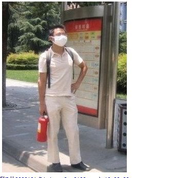 chengdu-person-prepared-fire-extinguisher-face-mask.jpg
