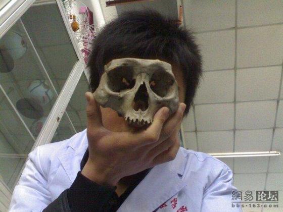 http://www.chinasmack.com/wp-content/uploads/2009/12/Medical-Students-Playing-with-Bones-3.jpg