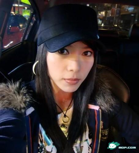 Chinese girl wearing a cap.